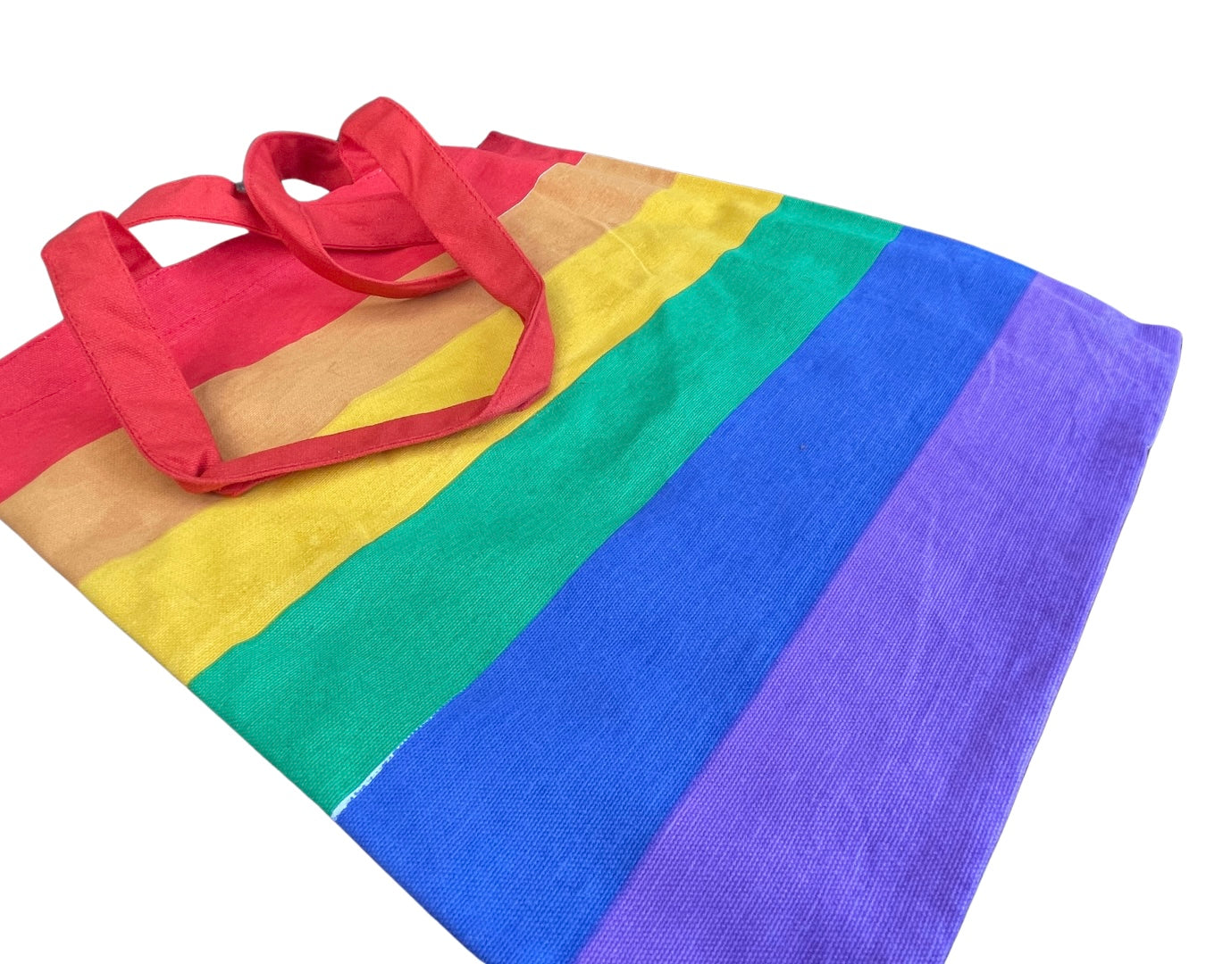 Umweltfreundliche Regenbogentasche aus recycelter Baumwolle.