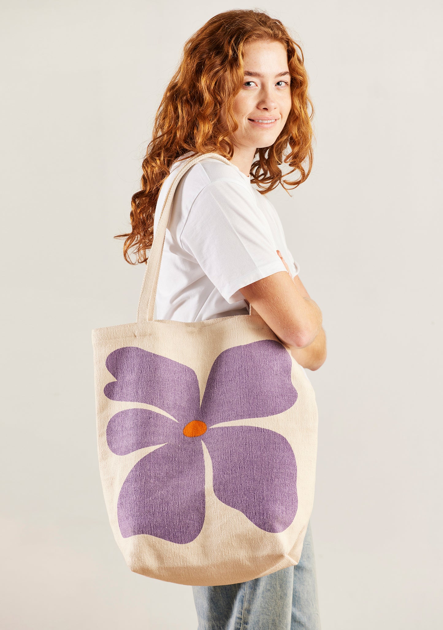 Bright joyful recycled cotton bags with bold flower prints. Long handles. Thick strong cotton.