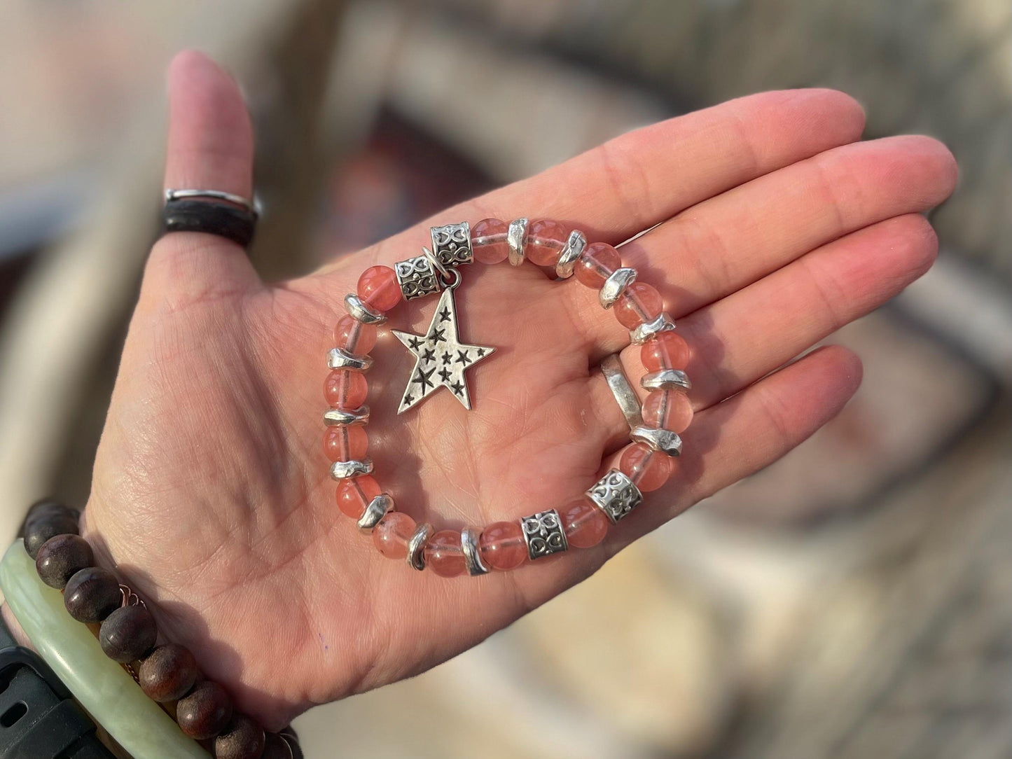 Strawberry quartz bracelet showcasing a silver star. Star jewellery, ethical jewellery, handmade pink bracelet. Congratulations gift.