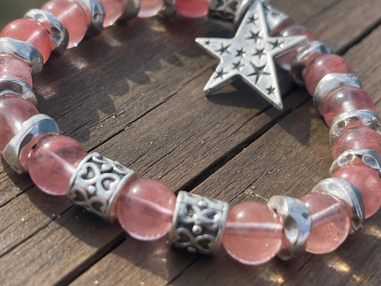 Strawberry quartz bracelet showcasing a silver star. Star jewellery, ethical jewellery, handmade pink bracelet. Congratulations gift.