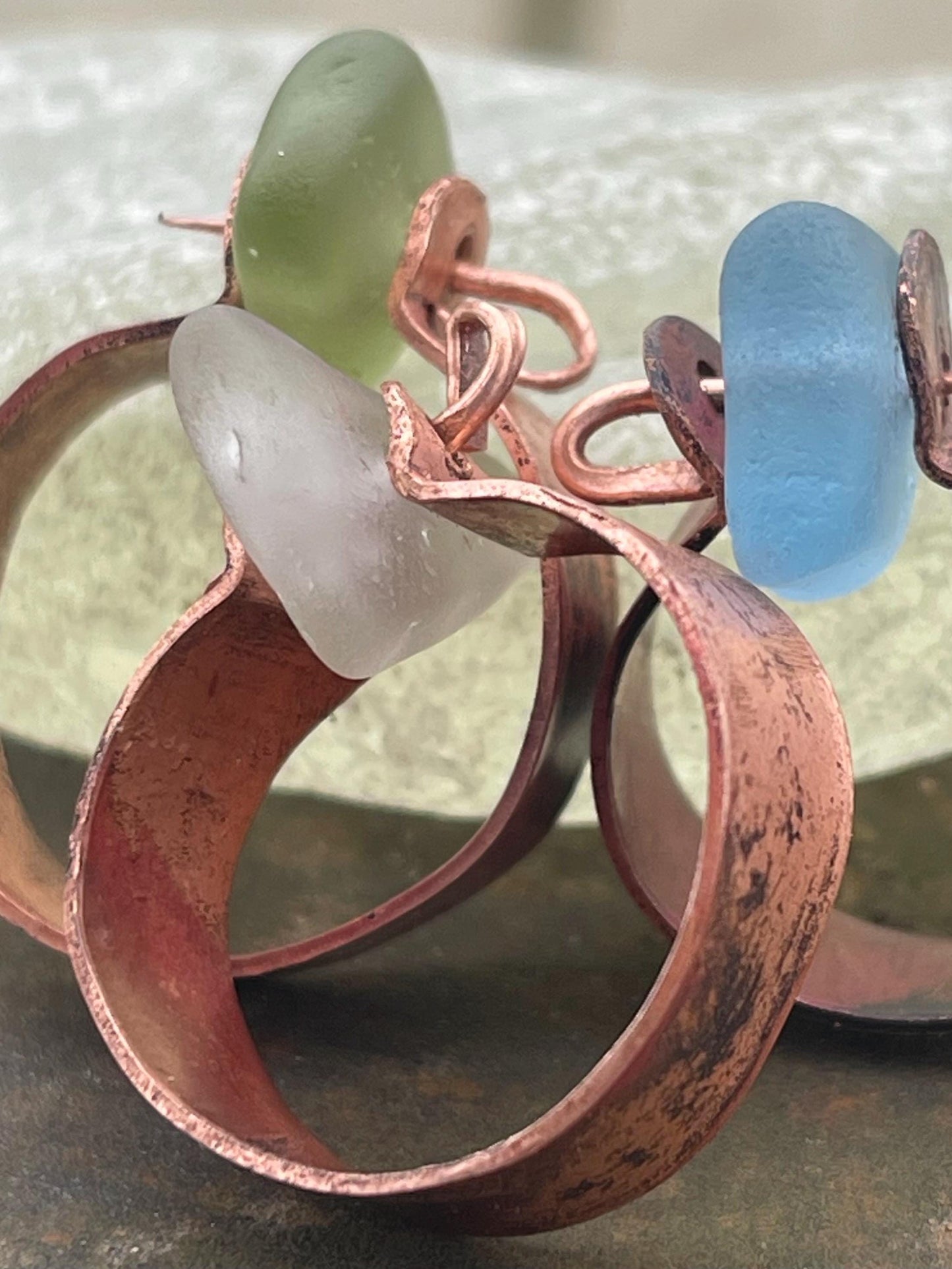 Recycled copper and sea glass rings. Handmade sea glass jewellery. Rings made with sea glass. Rustic jewellery. Handmade unusual rings.