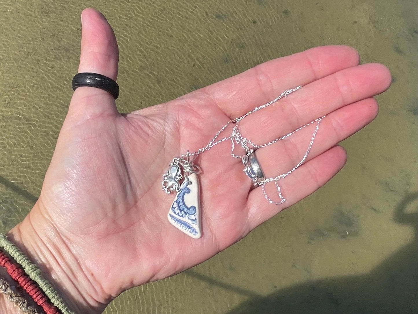 Eco friendly sea ceramic necklace on a recycled sterling silver chain showcasing a little octopus pendant, octopus necklace, eco jewellery