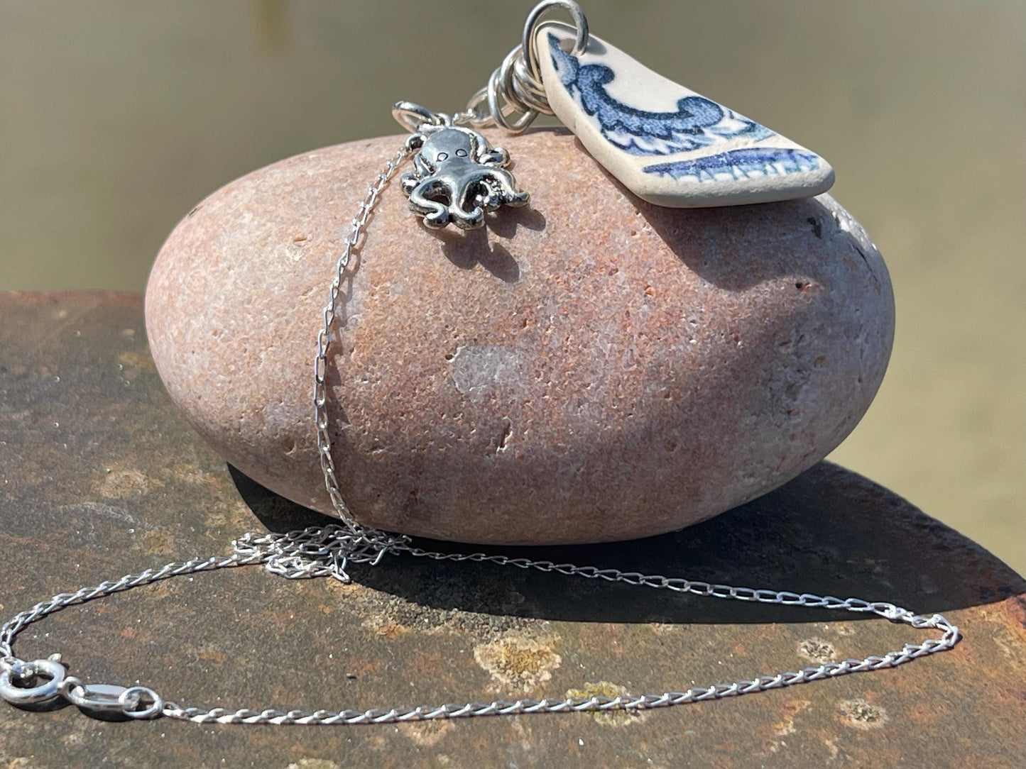 Eco friendly sea ceramic necklace on a recycled sterling silver chain showcasing a little octopus pendant, octopus necklace, eco jewellery