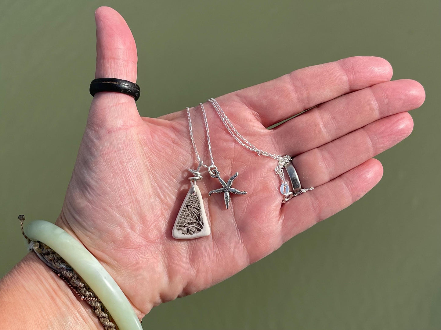 Eco friendly sea ceramic necklace on a sterling silver chain showcasing a little starfish pendant, starfish necklace, ethical jewellery