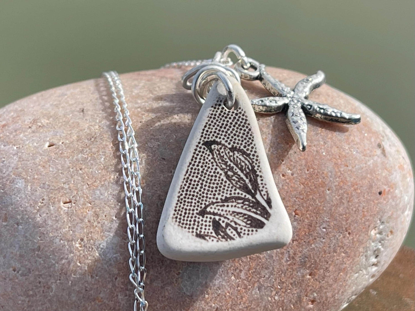 Eco friendly sea ceramic necklace on a sterling silver chain showcasing a little starfish pendant, starfish necklace, ethical jewellery
