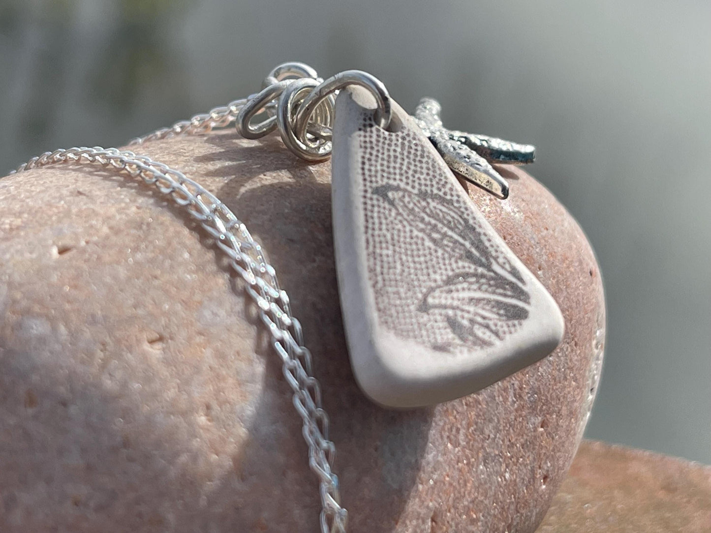 Eco friendly sea ceramic necklace on a sterling silver chain showcasing a little starfish pendant, starfish necklace, ethical jewellery