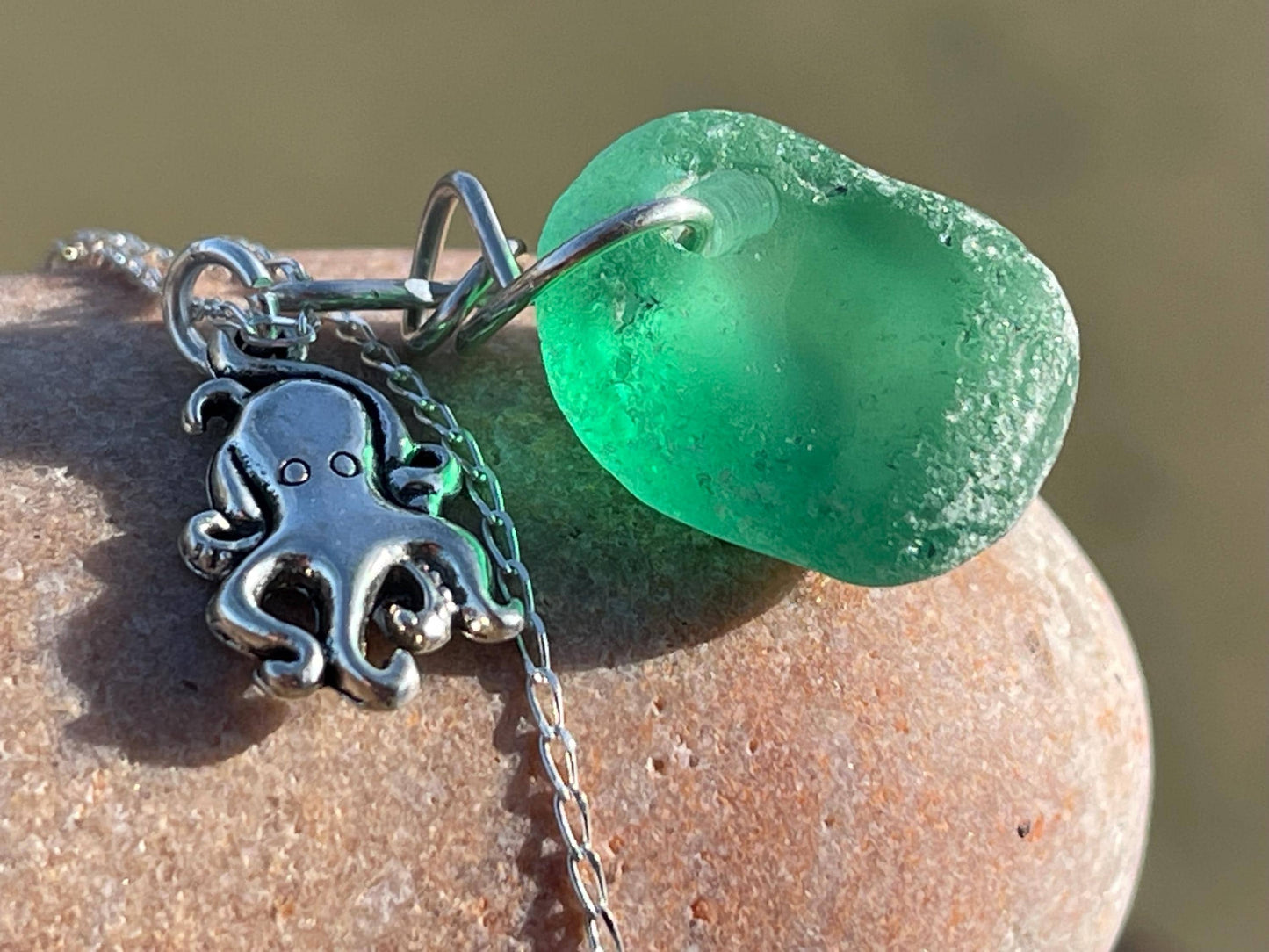 Eco friendly sea glass necklace on a sterling silver chain showcasing a little octopus. Octopus pendant, octopus necklace, eco jewellery