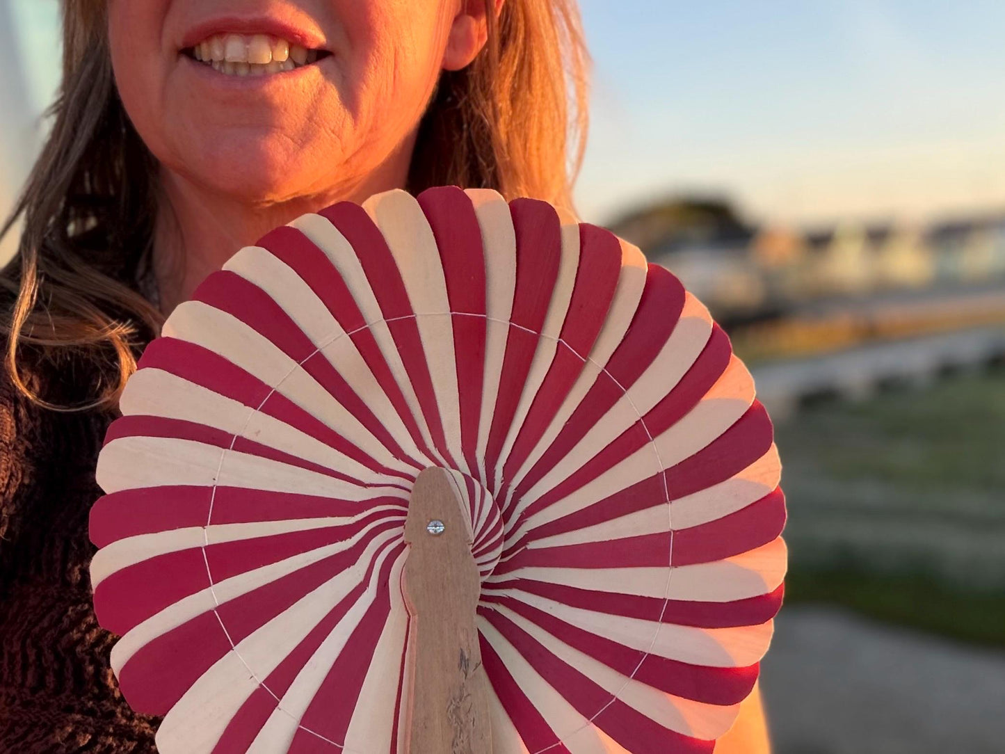 Absolutely beautiful eco friendly handheld bamboo fans. A wide range of colours. Large handmade fans. Eco gifts. Red, orange, green, purple.