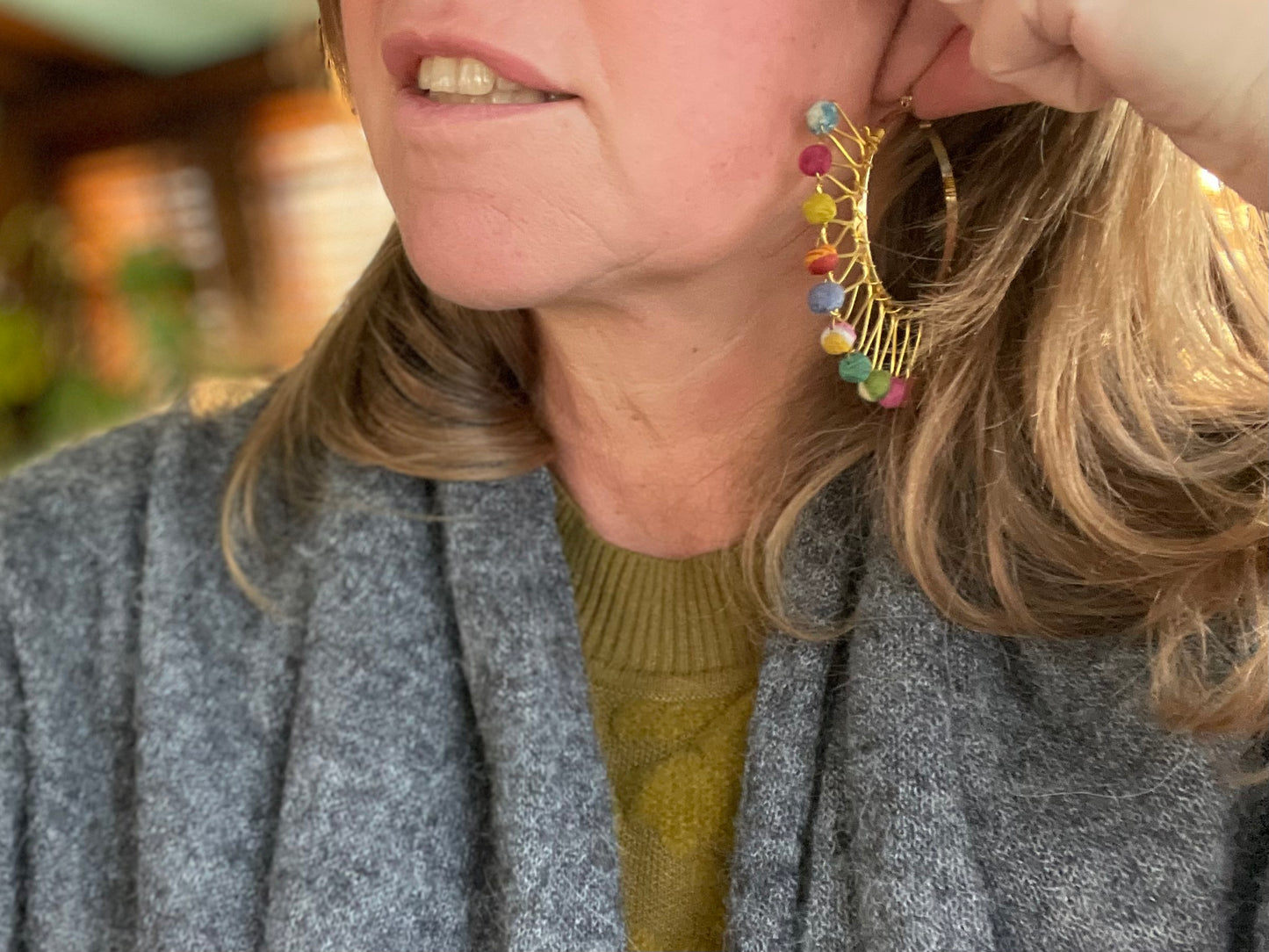 Handmade earrings made from waste textiles