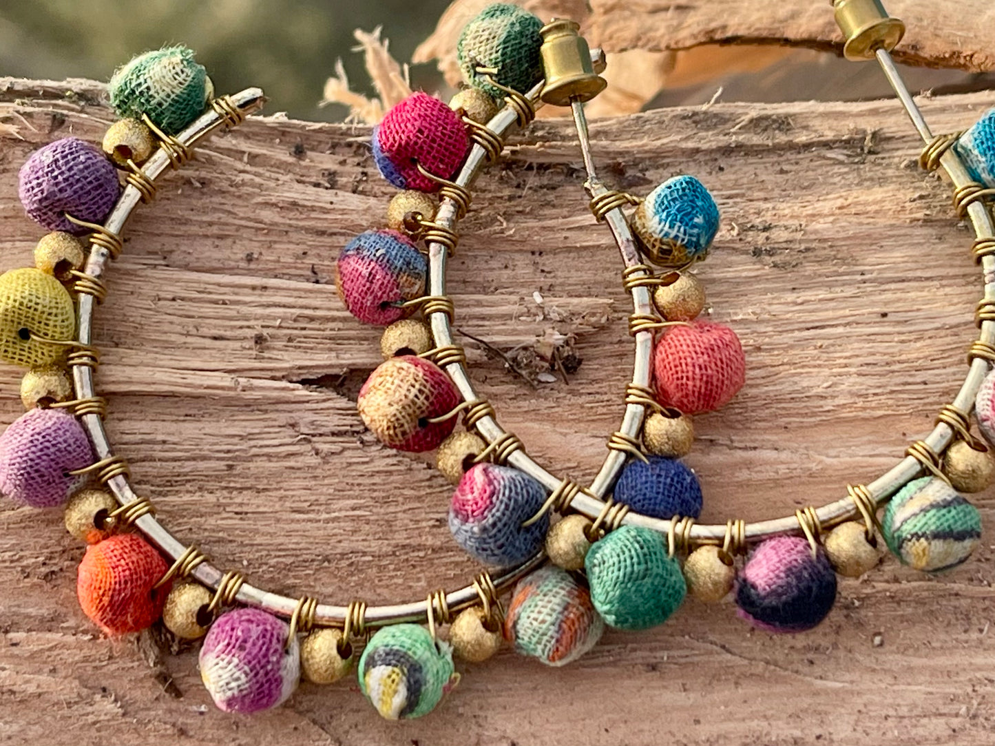 Handmade earrings made from waste textiles