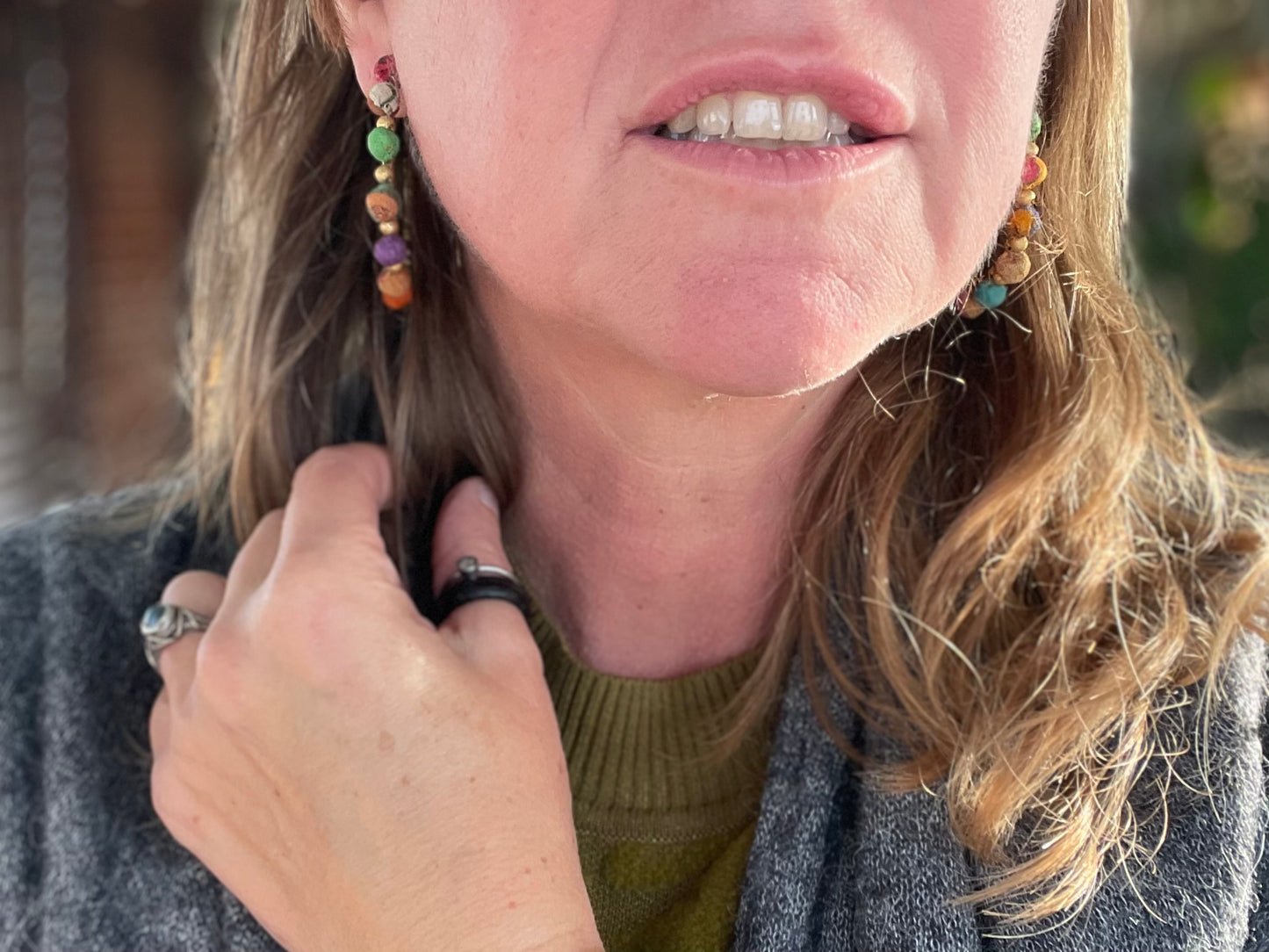 Handmade earrings made from waste textiles