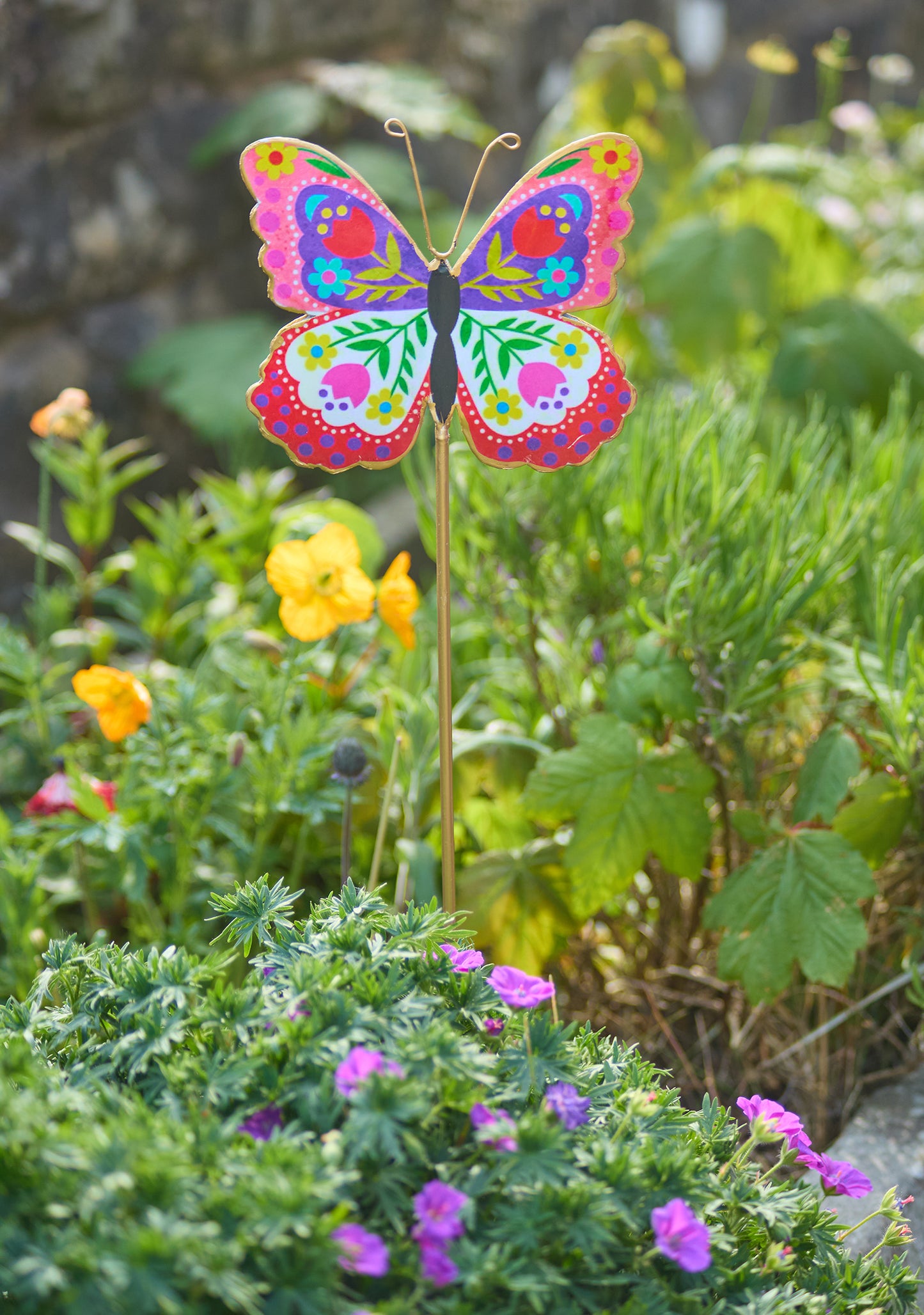 Butterfly garden stake. Beautiful garden decoration in the shape of a butterfly. Garden decor. Butterfly garden sculpture.
