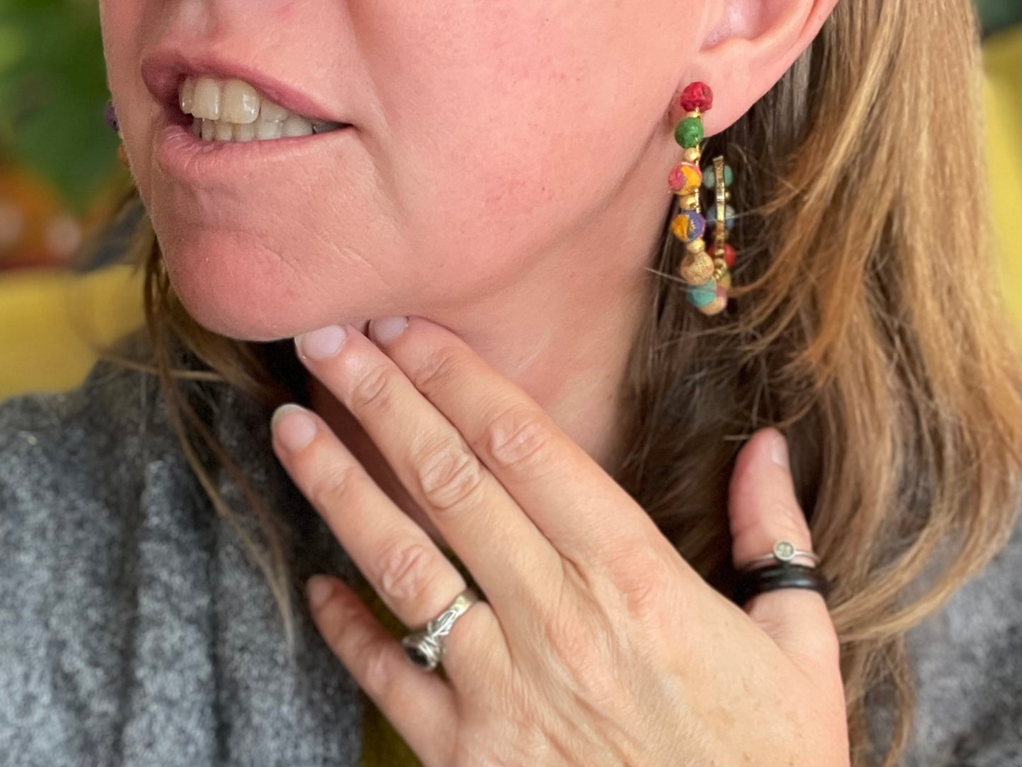 Handmade earrings made from waste textiles