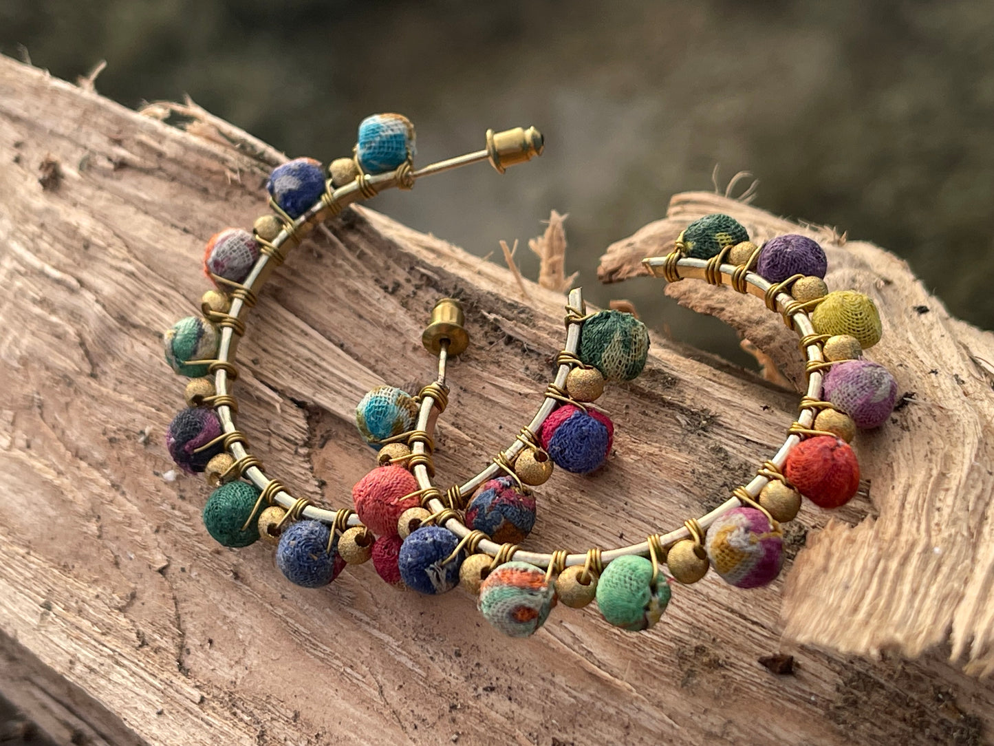 Handmade earrings made from waste textiles