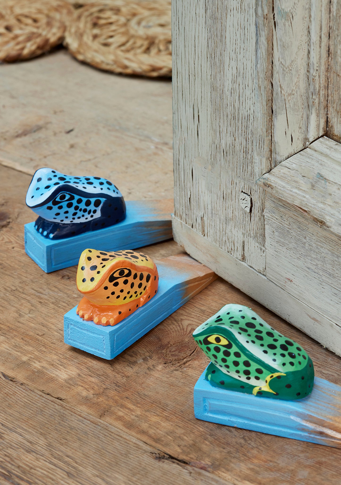 Frog door stop made from sustainable painted wood. Fun animal doorstop. Ethical gift ideas. Frog door stoppers.