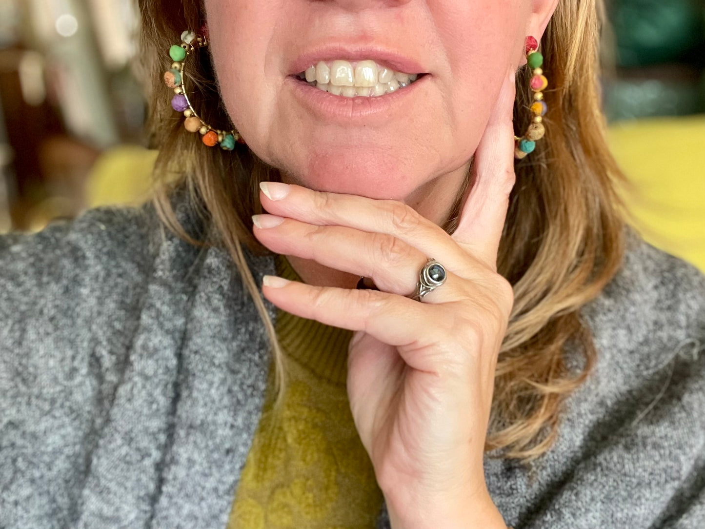 Handmade earrings made from waste textiles