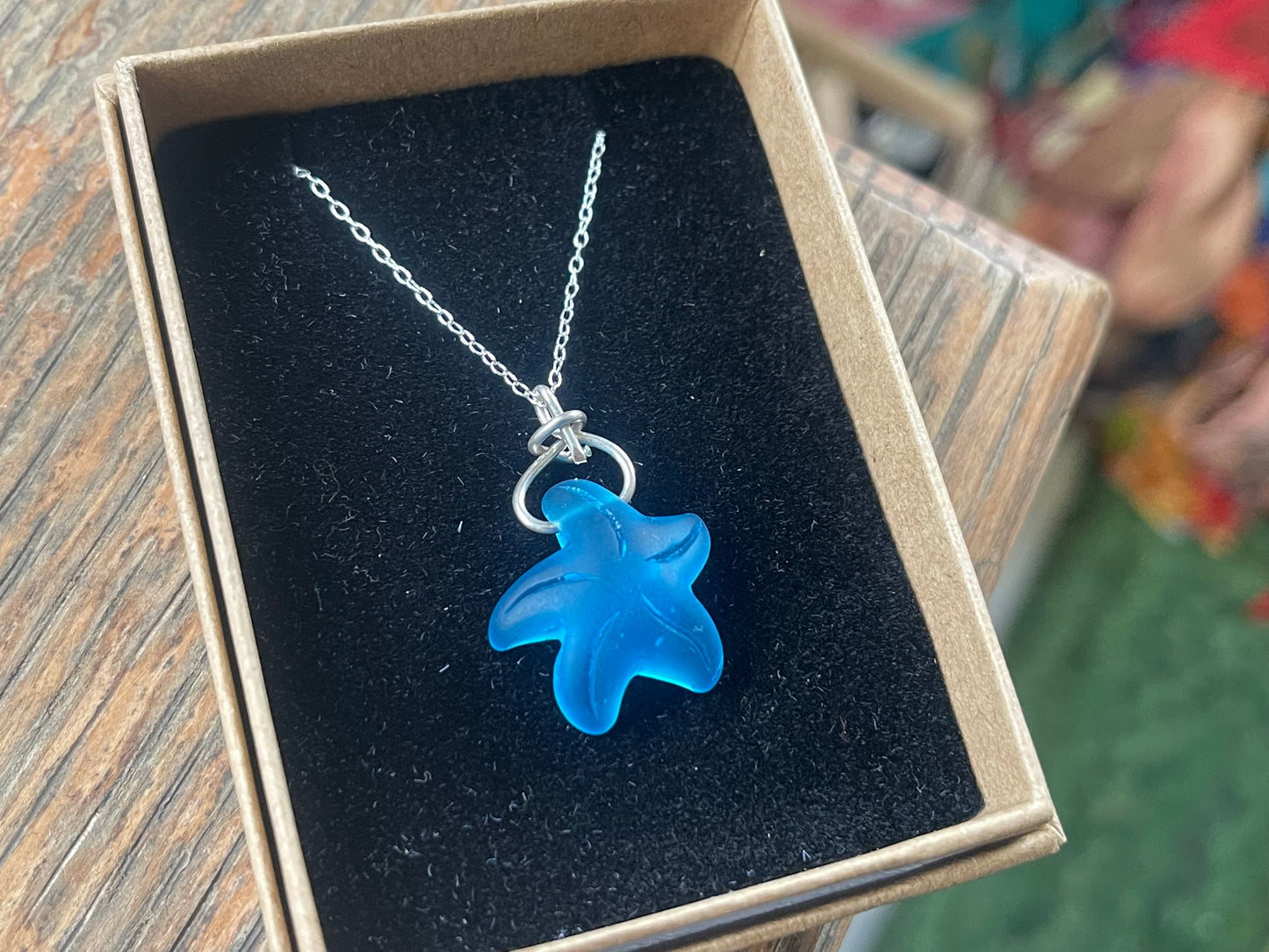 Eco friendly jewellery. Sea glass necklace on a sterling silver chain. Sea glass starfish necklace. Starfish pendant, ethical jewellery.