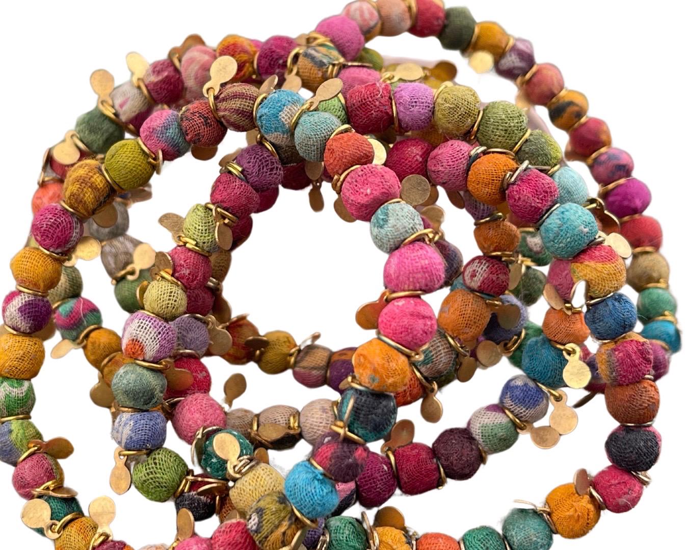 Recycled bracelet made from waste textiles. Handmade bracelet. Eco friendly bracelet. Sustainable jewellery. Ethical jewellery.