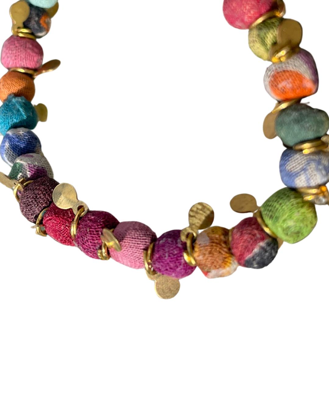 Recycled bracelet made from waste textiles. Handmade bracelet. Eco friendly bracelet. Sustainable jewellery. Ethical jewellery.