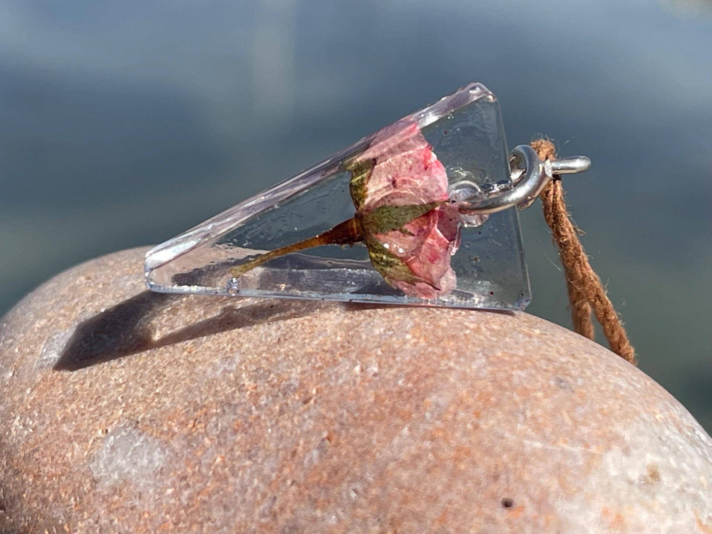 Handmade rose pendant wrapped in recycled sterling silver. Romantic handmade jewellery. Eco friendly jewellery. Ethical jewellery.