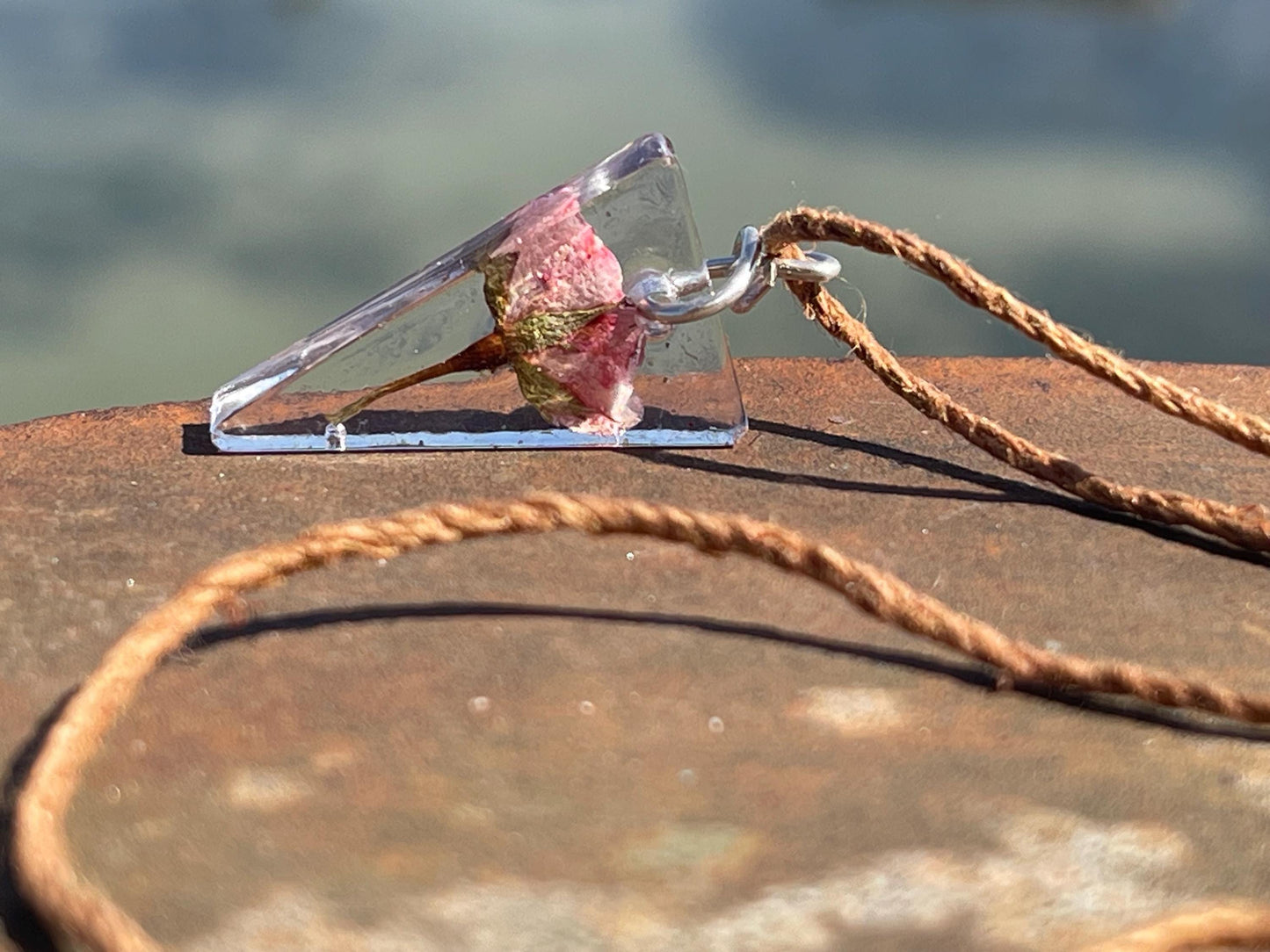 Handmade rose pendant wrapped in recycled sterling silver. Romantic handmade jewellery. Eco friendly jewellery. Ethical jewellery.