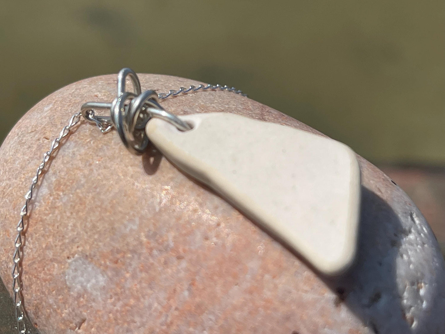 Eco friendly sea ceramic necklace on a recycled sterling silver chain showcasing a little octopus pendant, octopus necklace, eco jewellery