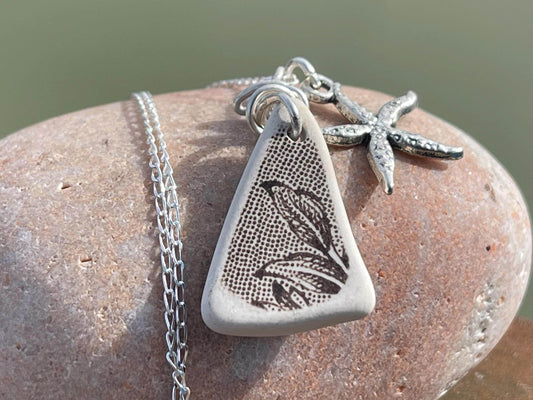 Eco friendly sea ceramic necklace on a sterling silver chain showcasing a little starfish pendant, starfish necklace, ethical jewellery