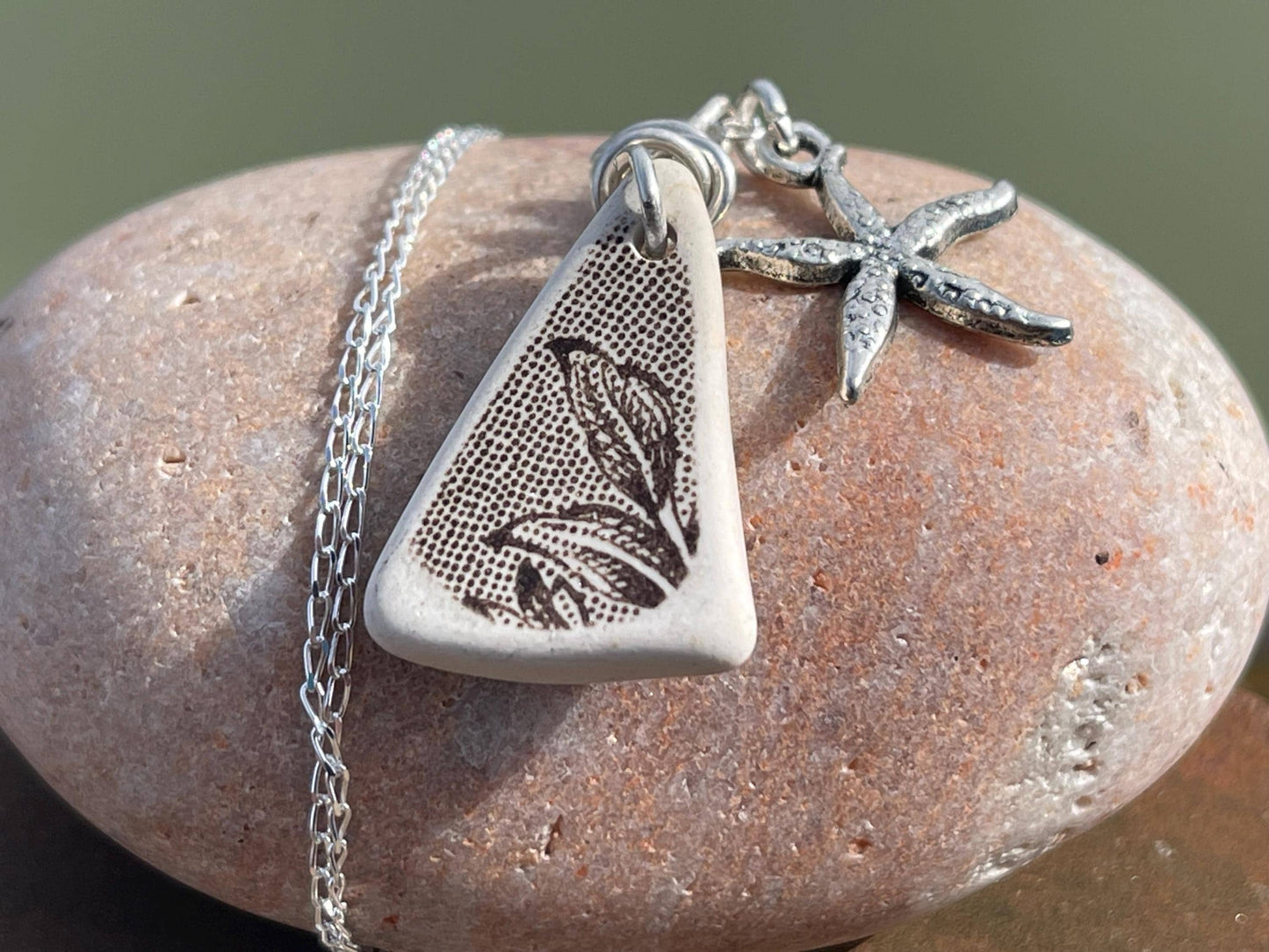 Eco friendly sea ceramic necklace on a sterling silver chain showcasing a little starfish pendant, starfish necklace, ethical jewellery