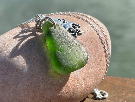 Eco friendly sea glass necklace on a sterling silver chain showcasing a little octopus. Octopus pendant, octopus necklace, ethical jewellery