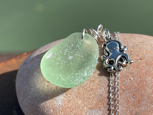 Eco friendly sea glass necklace on a sterling silver chain showcasing a little octopus. Octopus pendant, octopus necklace, eco jewellery