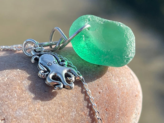Eco friendly sea glass necklace on a sterling silver chain showcasing a little octopus. Octopus pendant, octopus necklace, eco jewellery