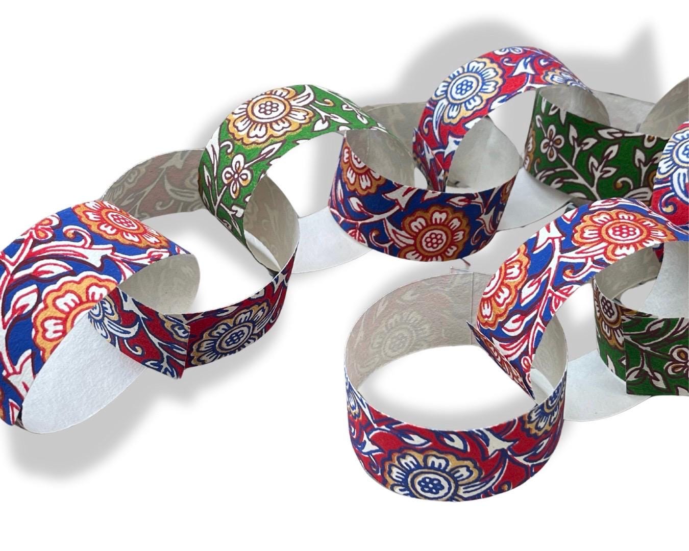 Recycled paper chains. Hand printed paper chains for parties and special occasions. Great family activity. Eco friendy paper garlands.