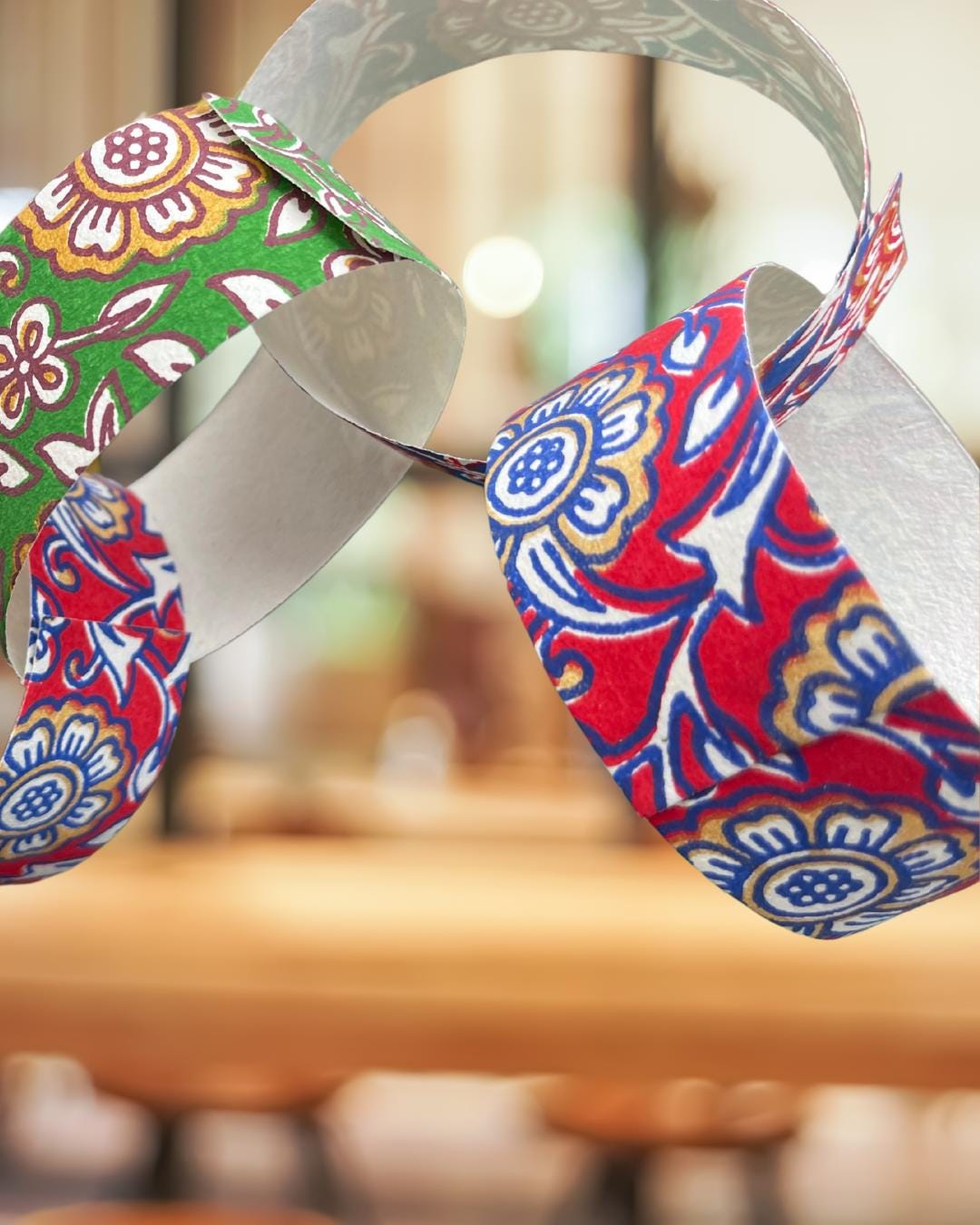 Recycled paper chains. Hand printed paper chains for parties and special occasions. Great family activity. Eco friendy paper garlands.