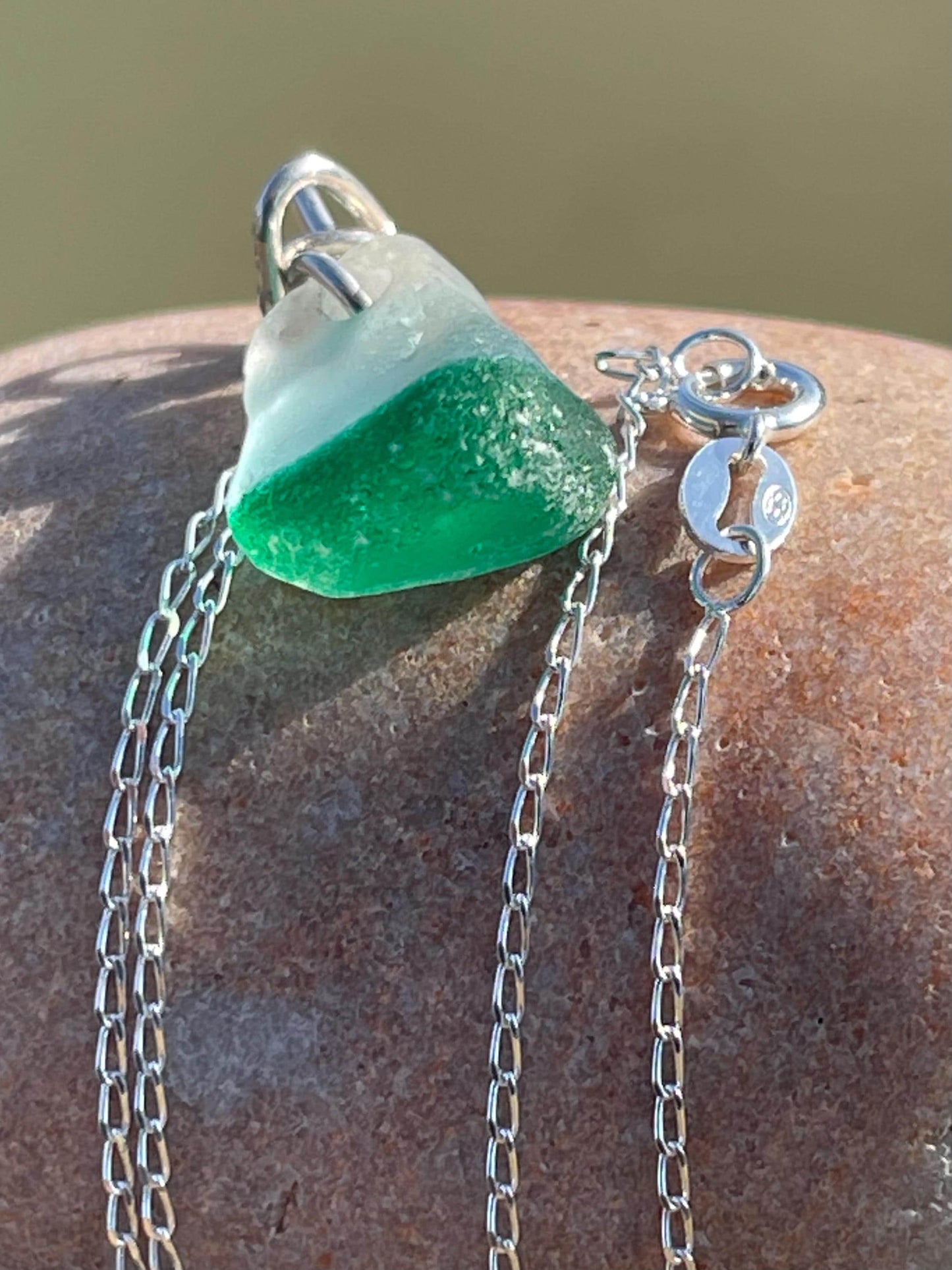 Eco friendly sea glass necklace on a sterling silver chain. Unusual sea glass pendant. Handmade eco friendly jewellery. Ethical jewellery.