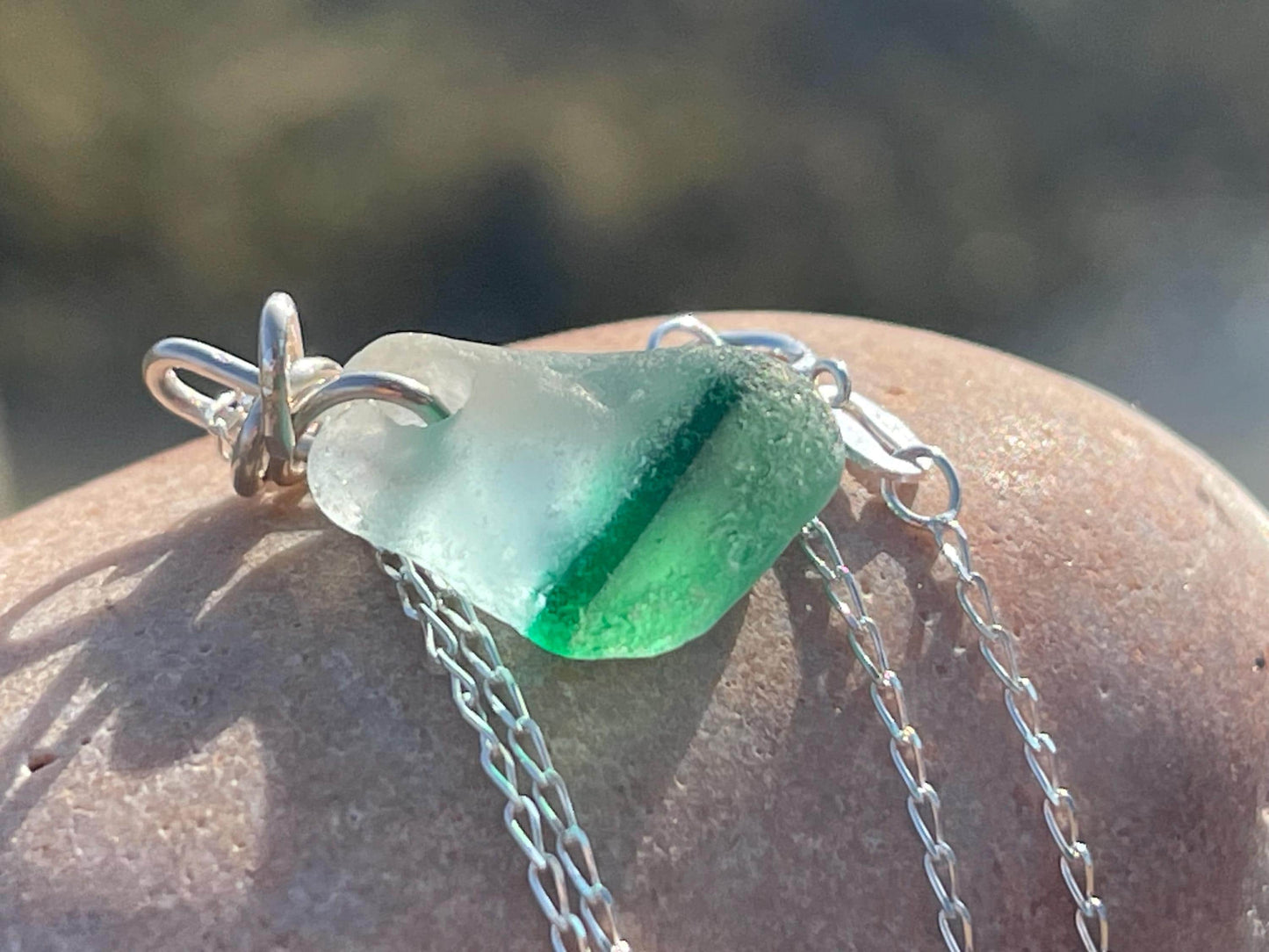 Eco friendly sea glass necklace on a sterling silver chain. Unusual sea glass pendant. Handmade eco friendly jewellery. Ethical jewellery.