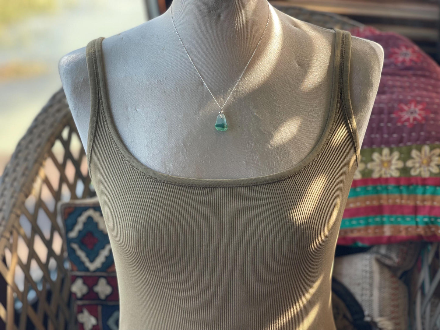 Eco friendly sea glass necklace on a sterling silver chain. Unusual sea glass pendant. Handmade eco friendly jewellery. Ethical jewellery.