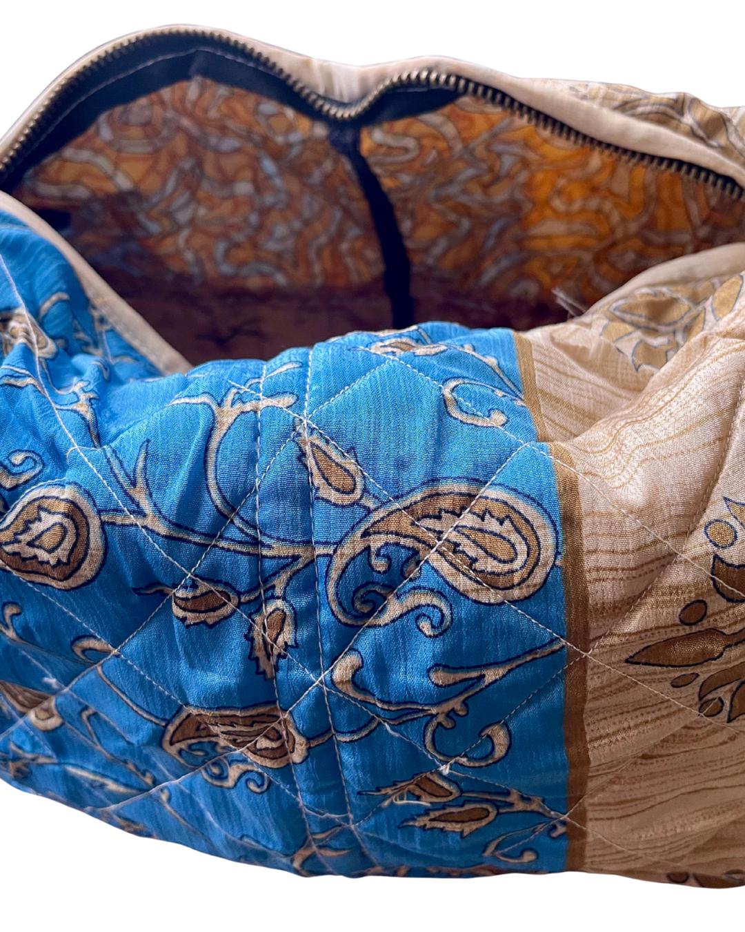 Large zip up recycled wash bag with 4 internal pockets. Wide range of colours. Made from recycled saris. Eco friendly wash bags.