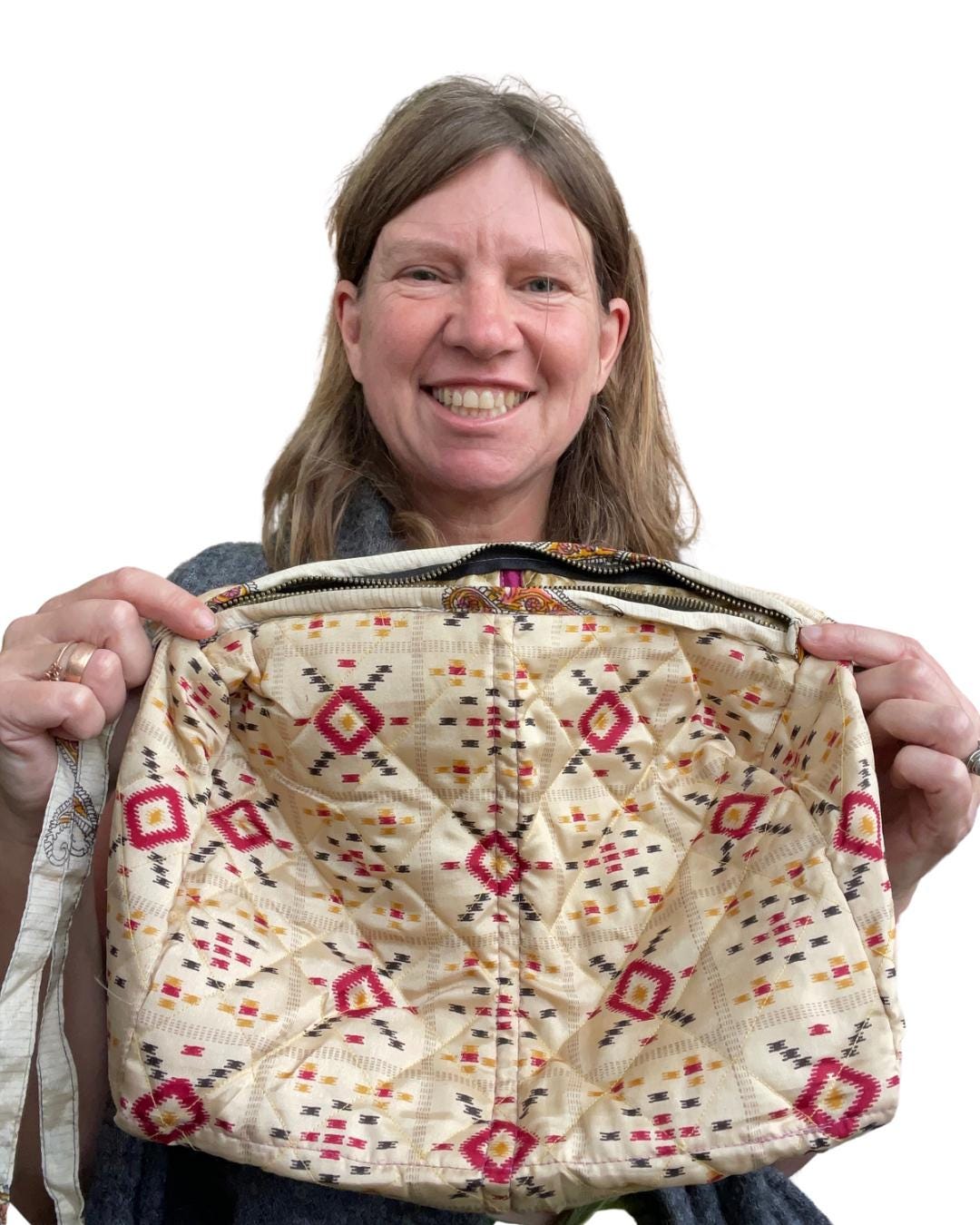 Large zip up recycled wash bag with 4 internal pockets. Wide range of colours. Made from recycled saris. Eco friendly wash bags.