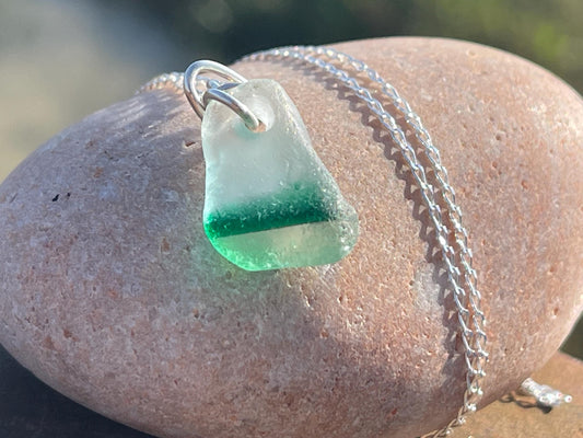 Eco friendly sea glass necklace on a sterling silver chain. Unusual sea glass pendant. Handmade eco friendly jewellery. Ethical jewellery.