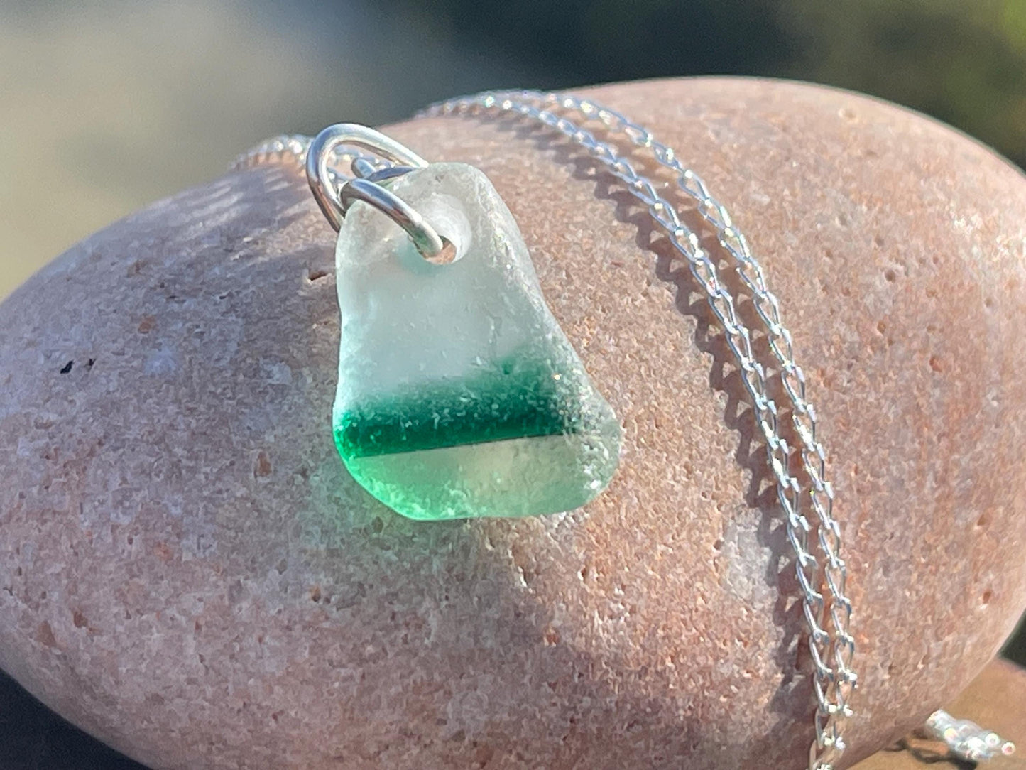 Eco friendly sea glass necklace on a sterling silver chain. Unusual sea glass pendant. Handmade eco friendly jewellery. Ethical jewellery.