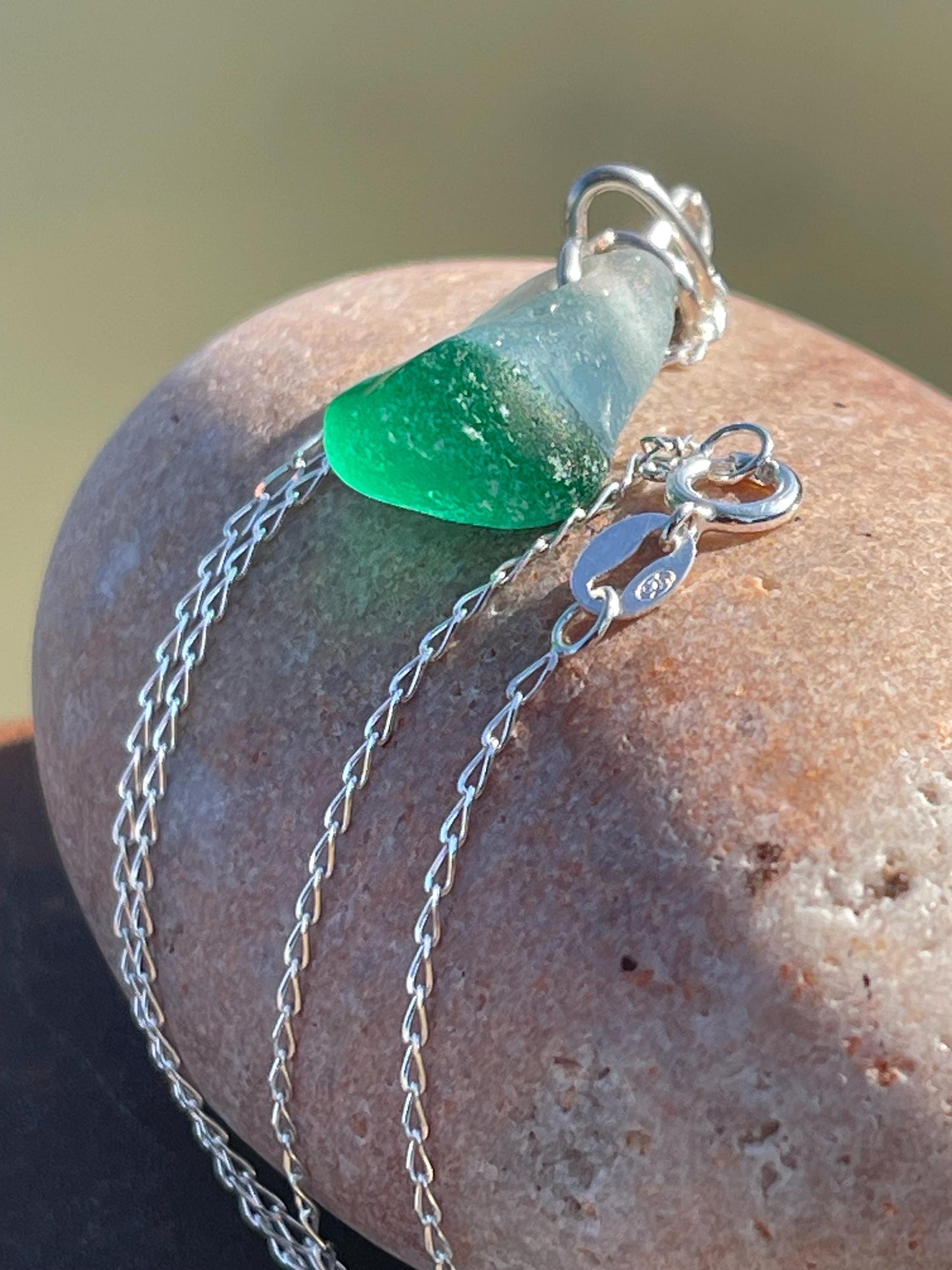 Eco friendly sea glass necklace on a sterling silver chain. Unusual sea glass pendant. Handmade eco friendly jewellery. Ethical jewellery.