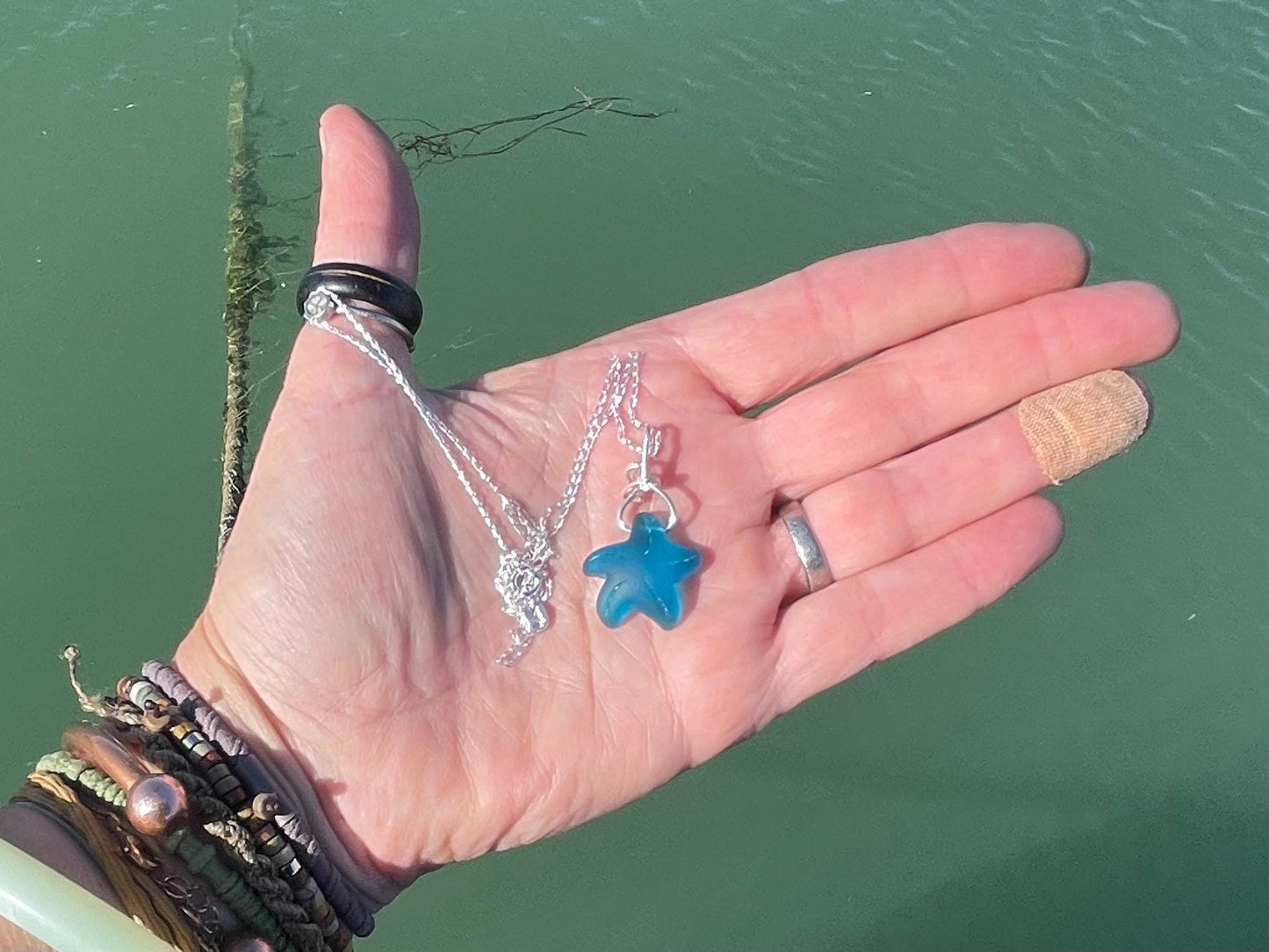 Eco friendly jewellery. Sea glass necklace on a sterling silver chain. Sea glass starfish necklace. Starfish pendant, ethical jewellery.