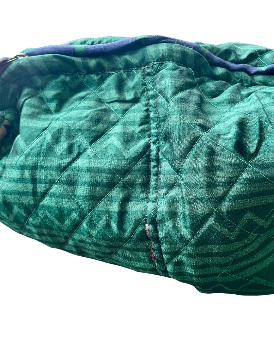 Large zip up recycled wash bag with 4 internal pockets. Wide range of colours. Made from recycled saris. Eco friendly wash bags.
