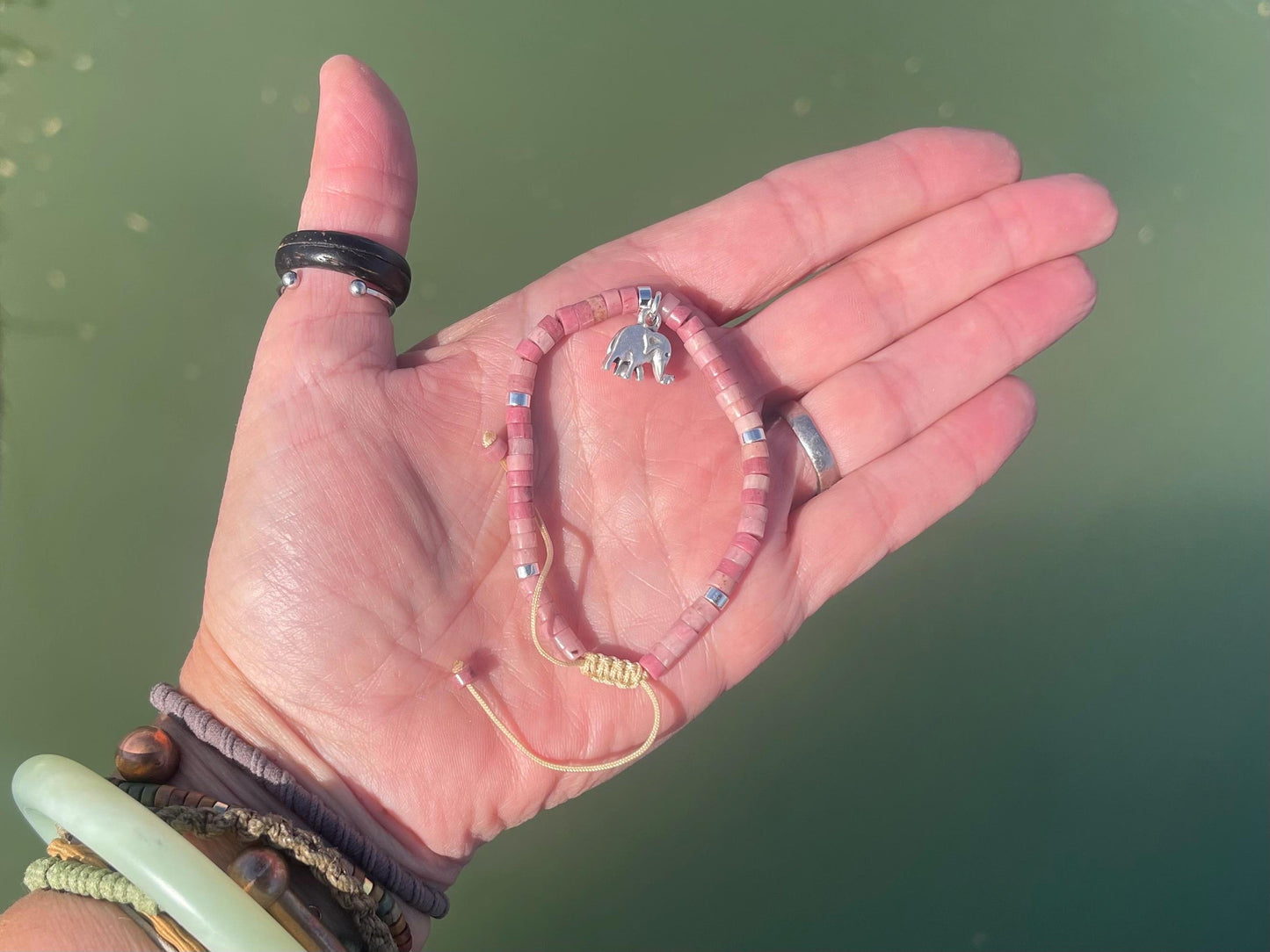 Adjustable rhodonite pink gemstone bracelet, handmade gift for him or her. Ethical jewellery, unique jewellery. Elephant bracelet.