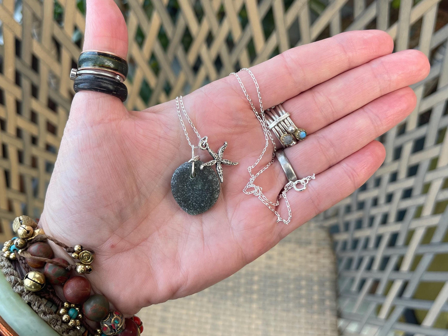 Eco friendly sea glass necklace on a sterling silver chain showcasing a little starfish. Starfish pendant,  eco friendly jewellery. Boho