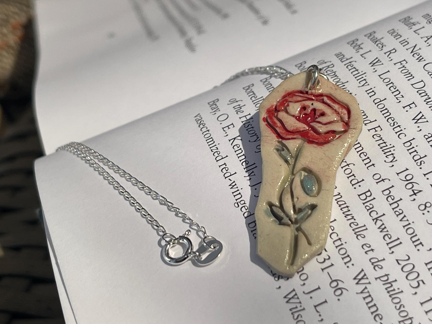 Handmade porcelain rose pendant. Eco friendly jewellery. Handmade rose necklaces on recycled sterling silver. Ethical jewellery. Eco gifts.
