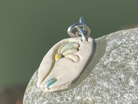 Handmade porcelain daisy pendant. Eco friendly jewellery. Handmade daisy necklaces on recycled sterling silver. Ethical jewellery. Eco gifts.