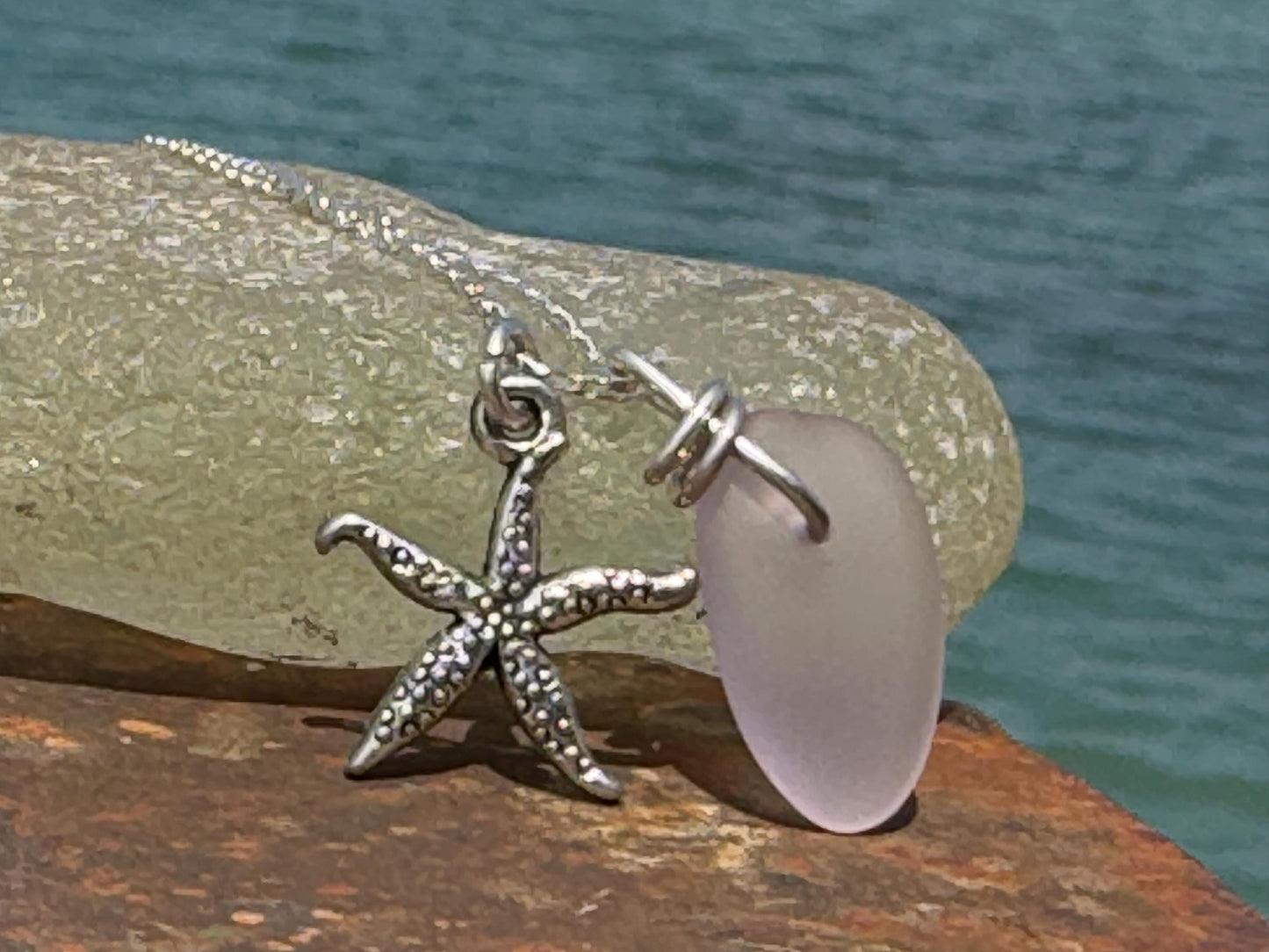 Eco friendly sea glass necklace on recycled sterling silver. Eco friendly jewellery. Ethical handmade jewellery. Starfish necklace.