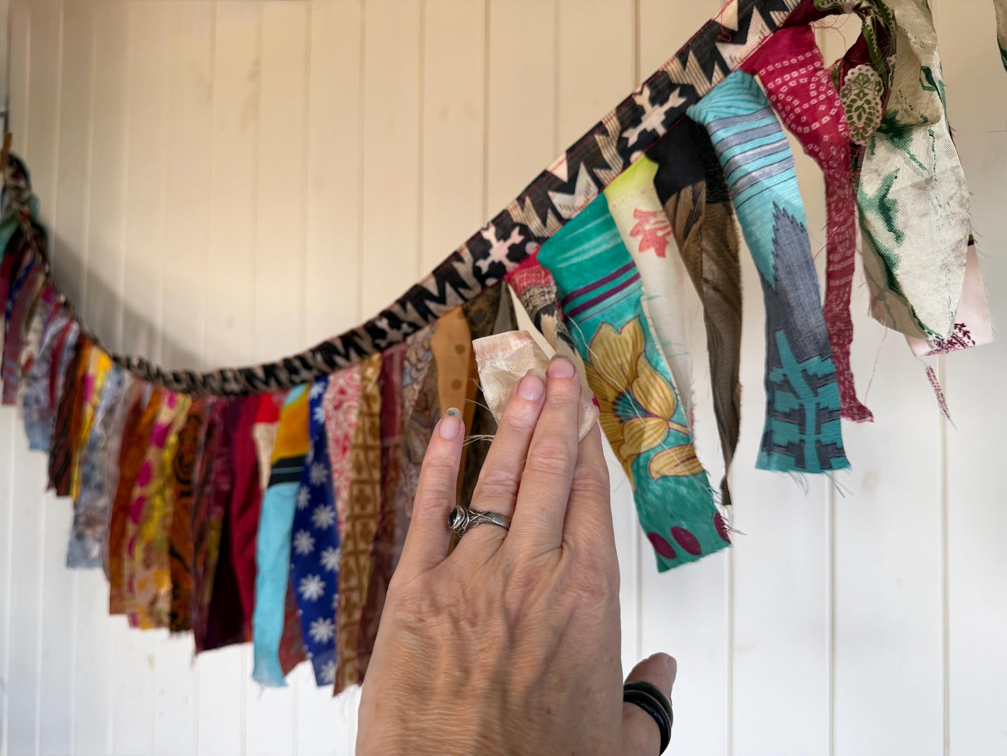 Long strips of multi-coloured rag bunting. Party bunting, wedding bunting, recycled sari bunting. Ideal for festivals, camping, birthdays