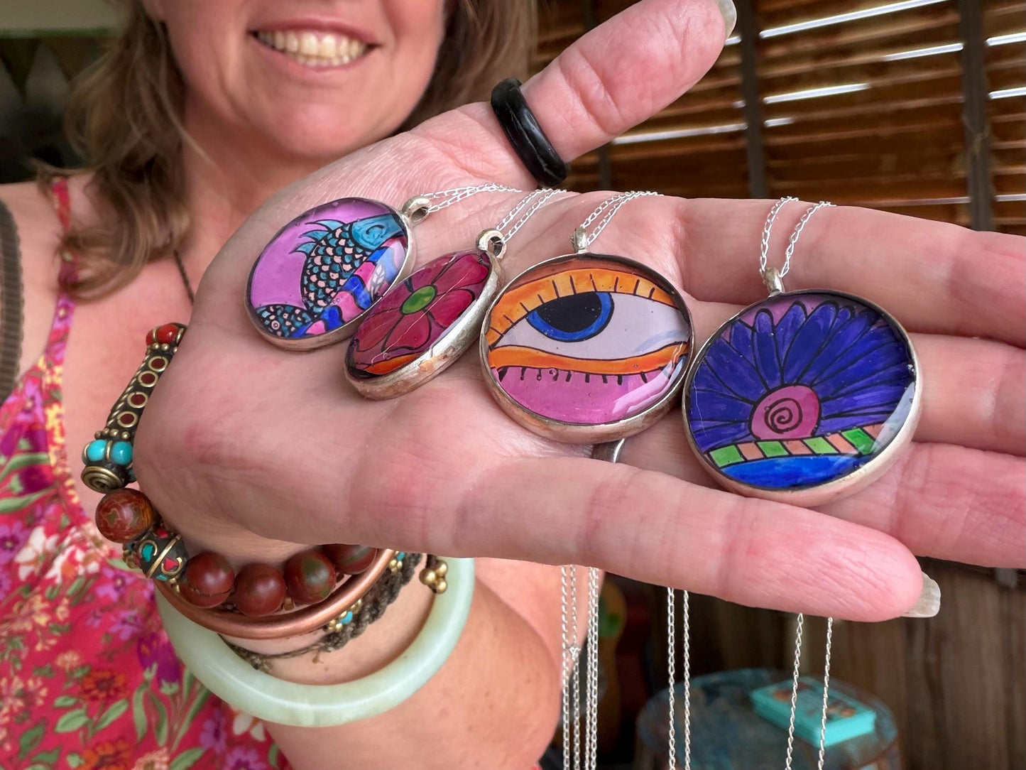 Bright joyful necklaces made with my own photos & recycled sterling silver. Eco friendly jewellery. Boho colourful pendants. Bright pink.